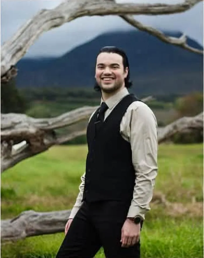 Flippie Blaauw, founder of Filipé, smiling outdoors